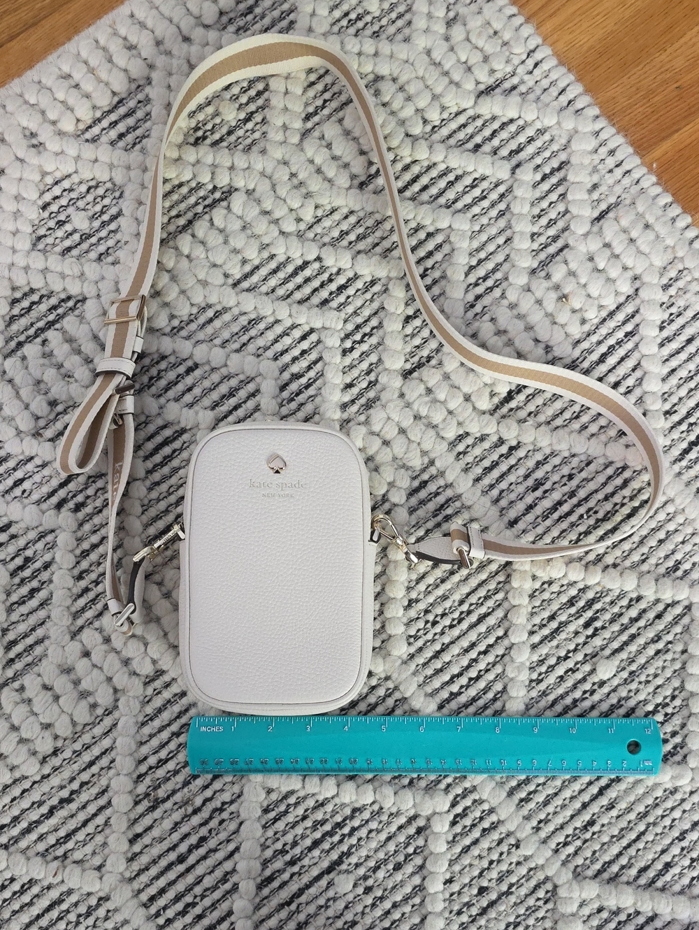 kate spade White Pebbled Leather Crossbody Phone Pouch with Striped Strap